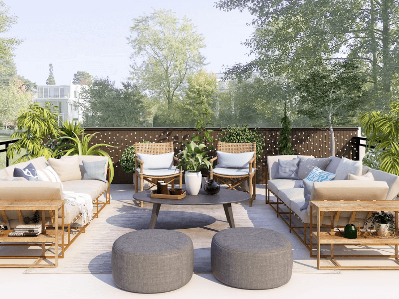 salón de jardín con sillas y sillones